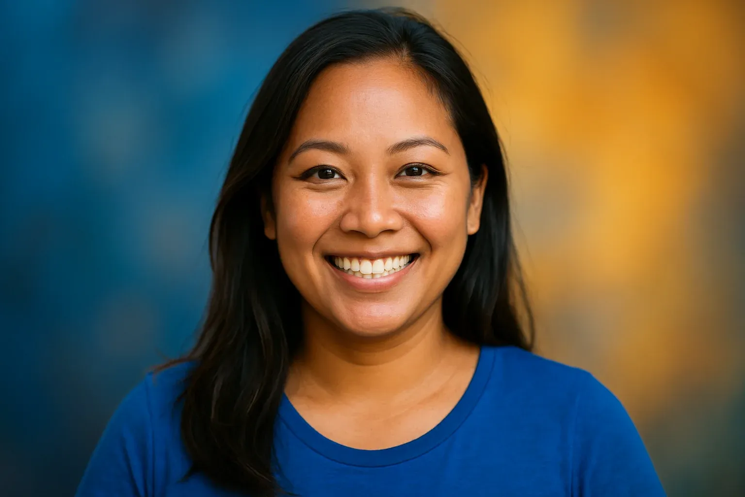 Smiling Filipino woman portrait on abstract blue and gold registration background